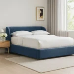 Luxury upholstered bed in velvet fabric featuring smooth corners and minimalist design